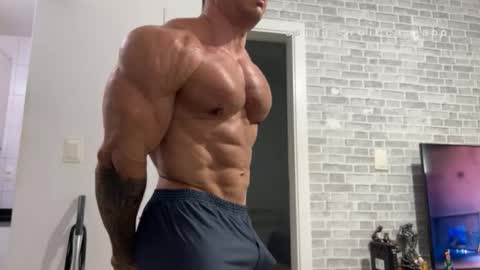 Snapshot of couplemuscle40 chatting on 02-12-26, 12:33 couplemuscle40 online show from 02-12-26, 12:33